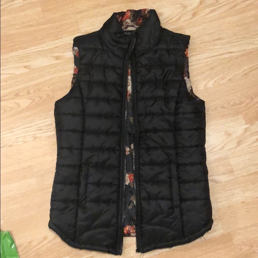 Black vest with floral pattern